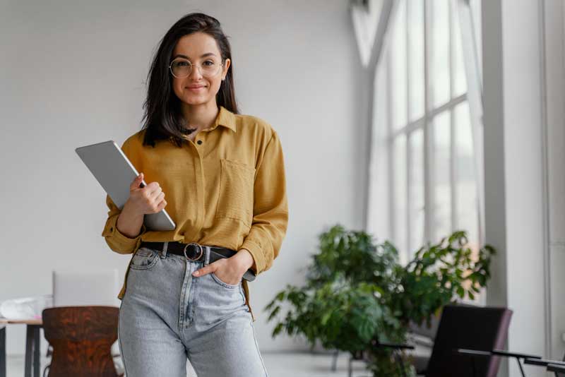 young-businesswoman-posing-with-copy-space-WEB